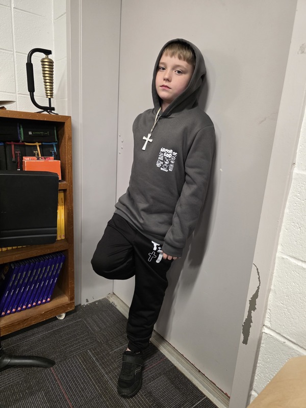 Student standing by door.