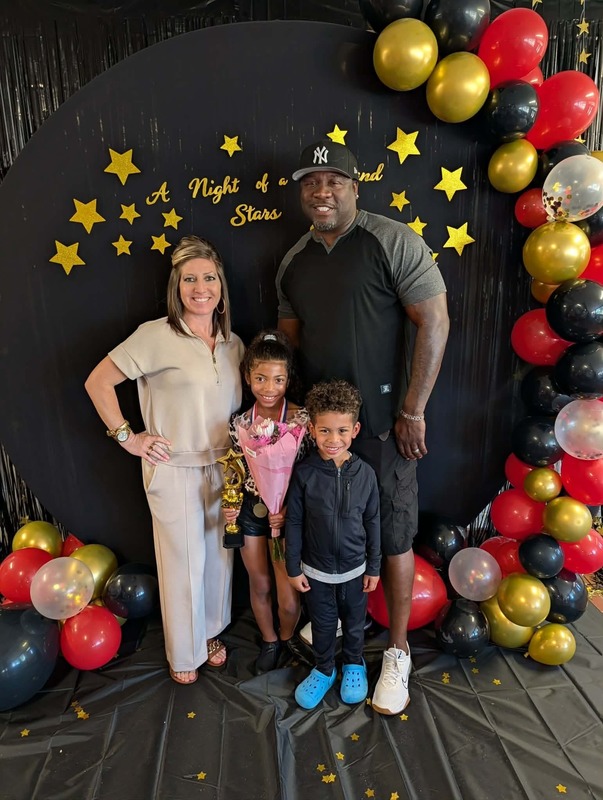 Performer with family.