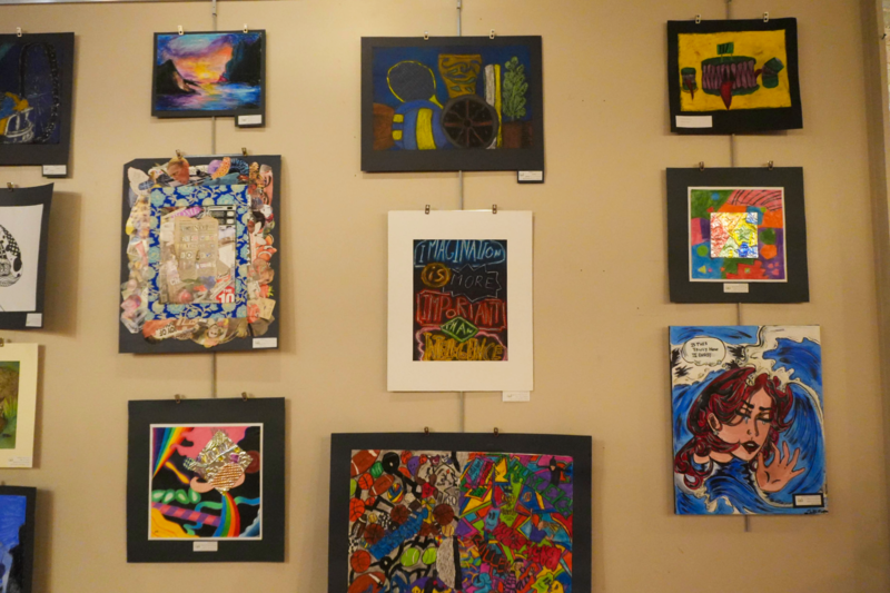 Art wall with colorful pieces.