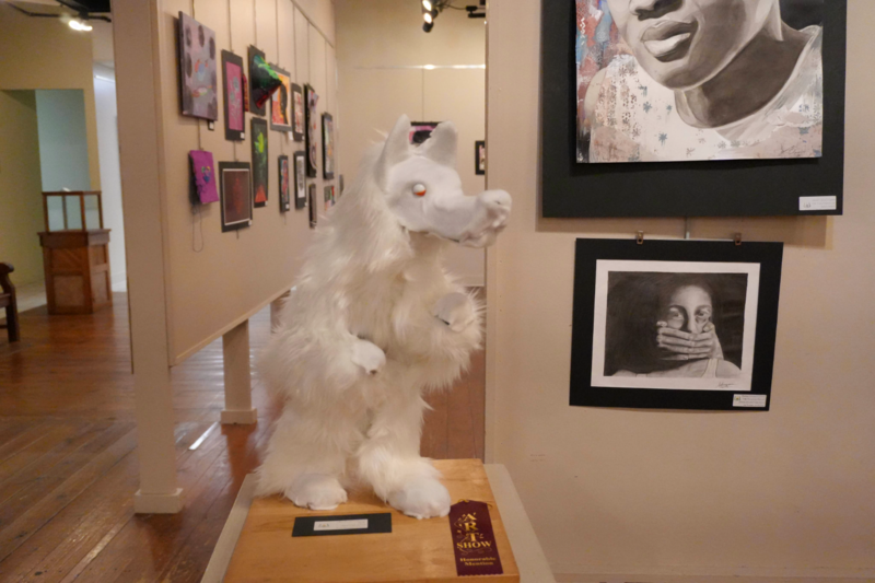 Three foot tall wolf sculpture made with fur fabric.