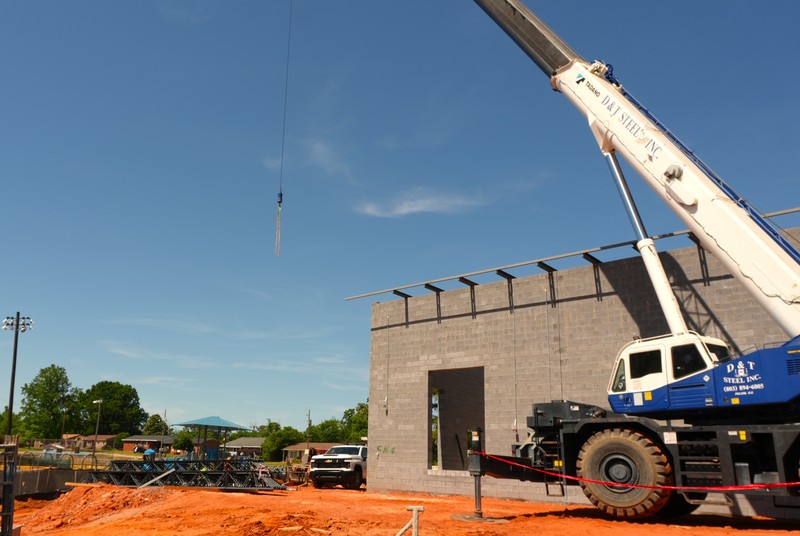 Construction vehicle working on the new building.
