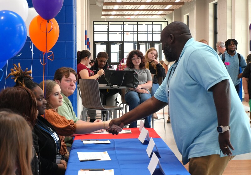 Wagener-Salley Prinicpal shakes students hands.