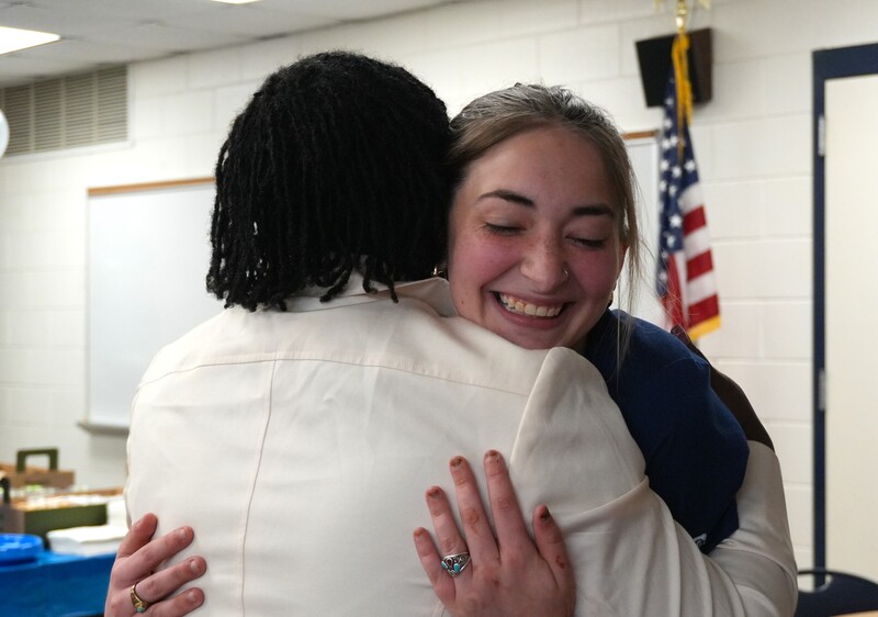 An ACCTC student hugs Aiken Intermediate science teacher Lalisa Folk.