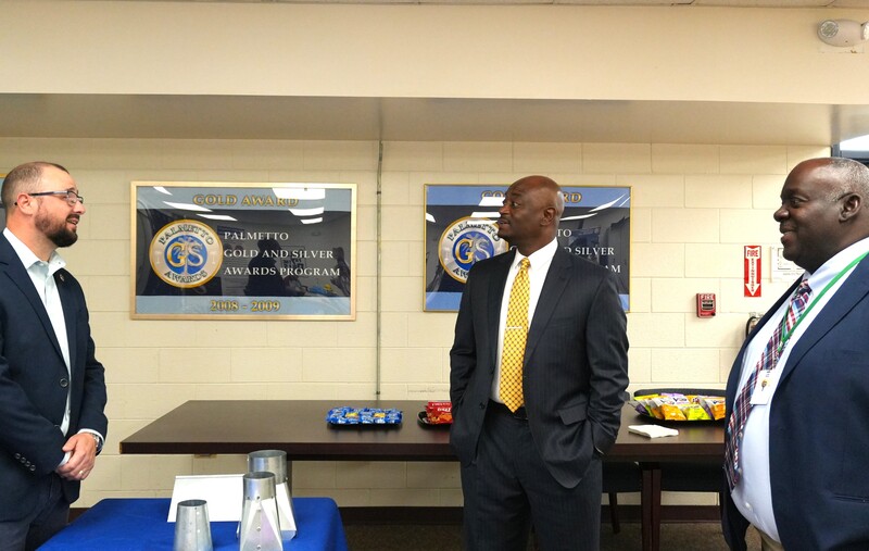 Dr. Corey Murphy and Mr. Kenneth Lott speak with a local trade union.