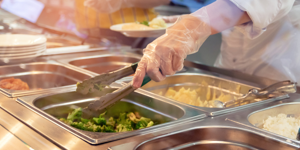 MEAL SERVICE LINE WITH FOOD IN SEPARATE CONTAINTERS