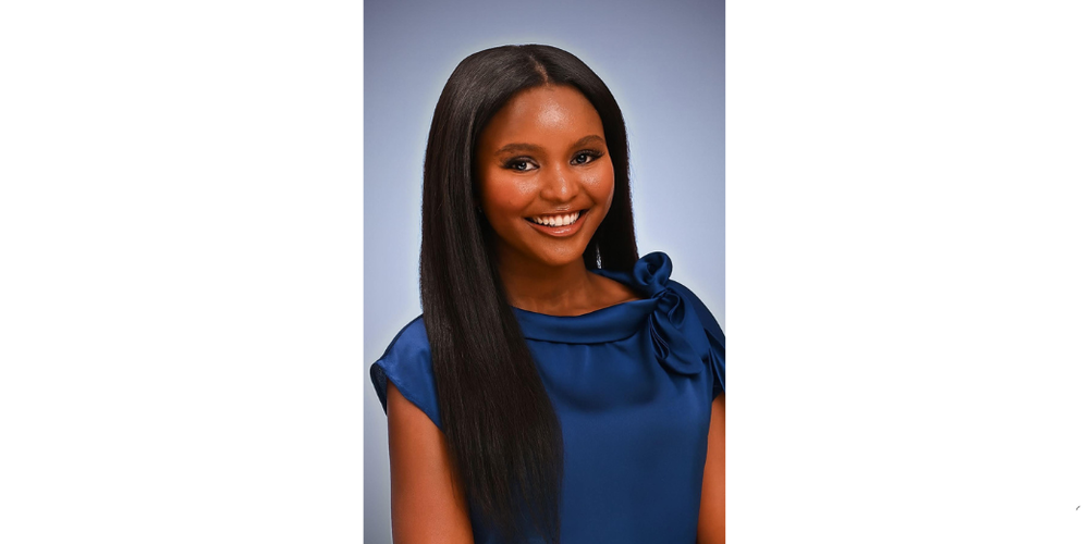 photo of female student in royal blue outfit