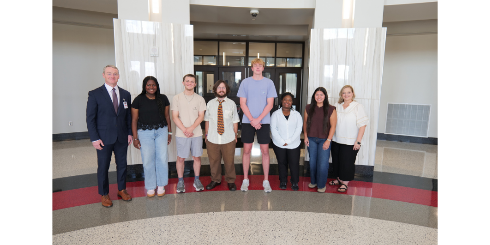 SIX STUDENTS AND TWO ADULTS IN HS LOBBY