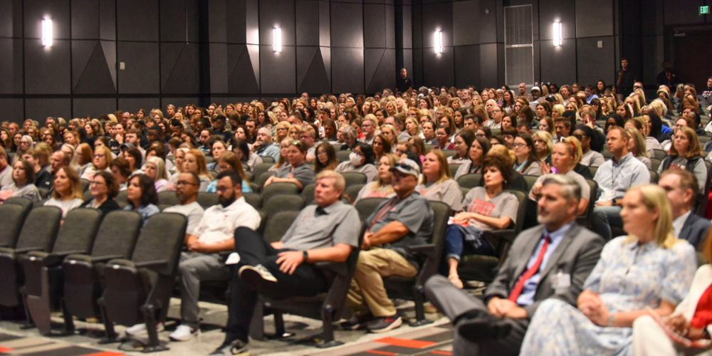 WIDE SHOT OF AUDIENCE
