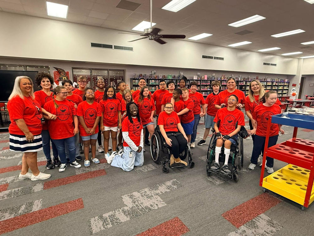 students in red shirts