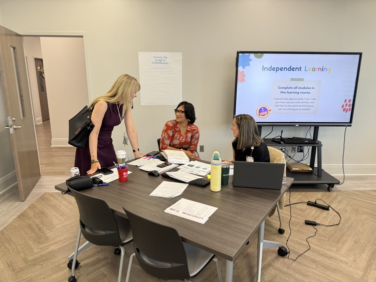 teachers conferring