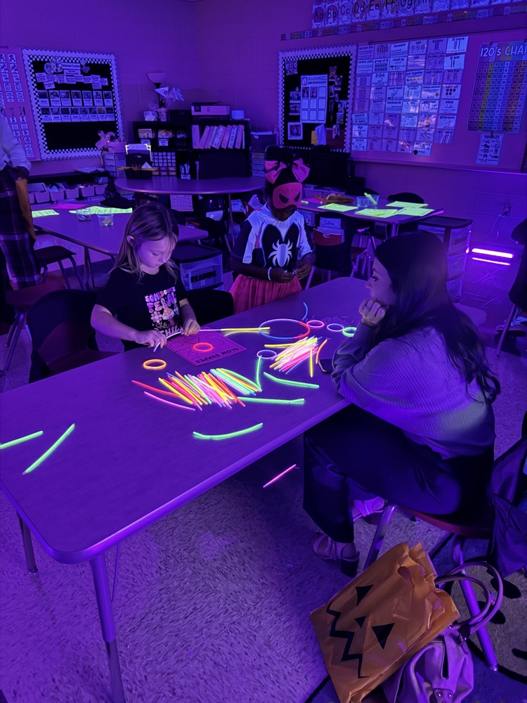 classroom set up as a glow learning station for Halloween