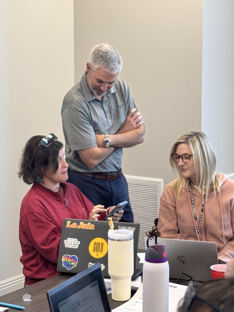 Teachers and administrators collaborating