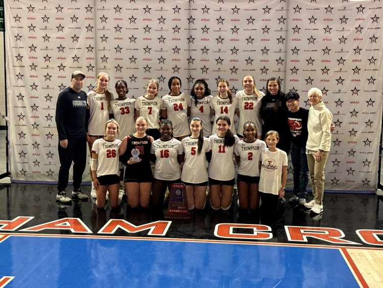 volleyball team posing for photo