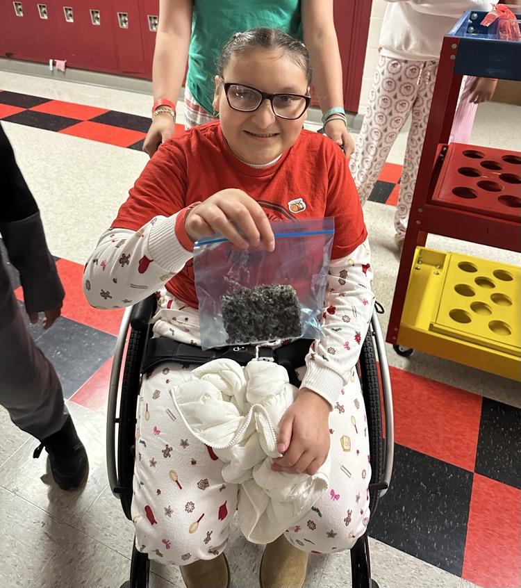 student with rice Krispy