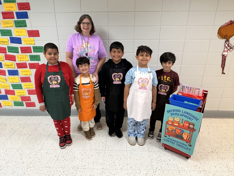 students and teacher in hallway with coffee cart 