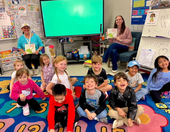 ms andrews and ms godsey reading to a class