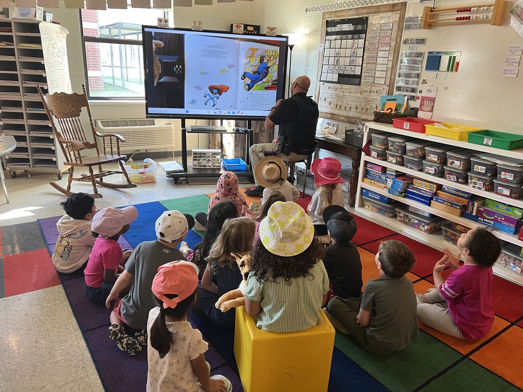 officer douglass reading to a class