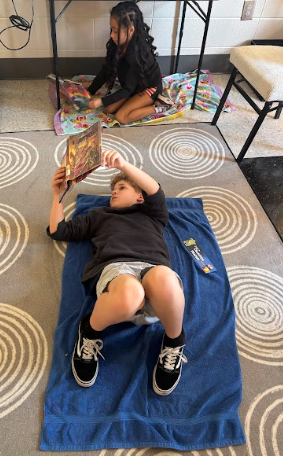 kids reading on the floor