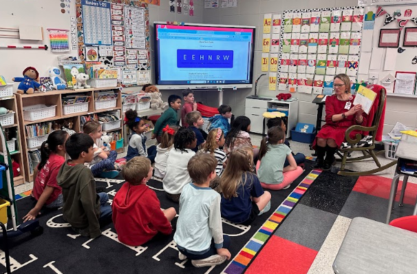 ms. cole reading to a class