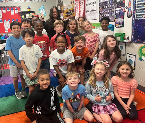 parent posing with class