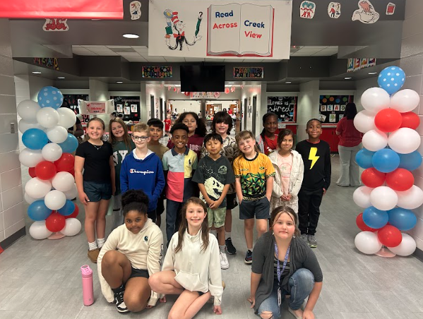 class in front of read across america sign