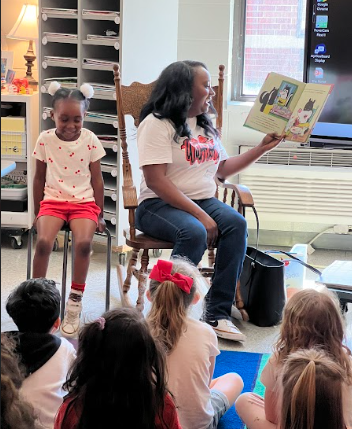 parent reading to class