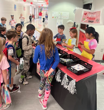 students selling stickers