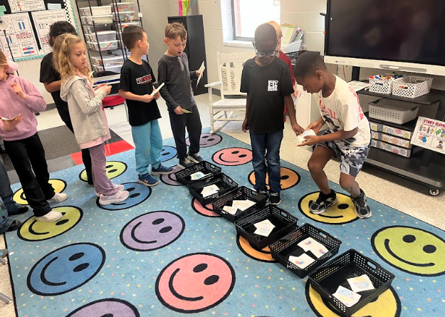 students sorting stickers