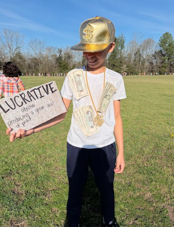 boy dressed as the word lucrative