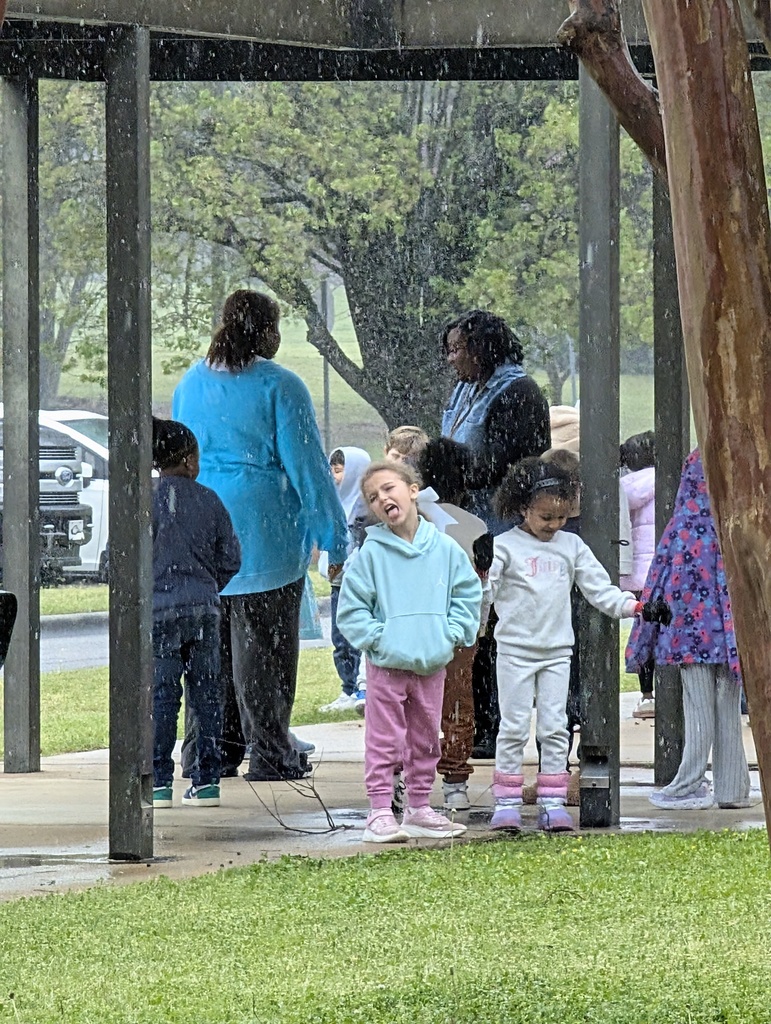 little girl sticking out tongue