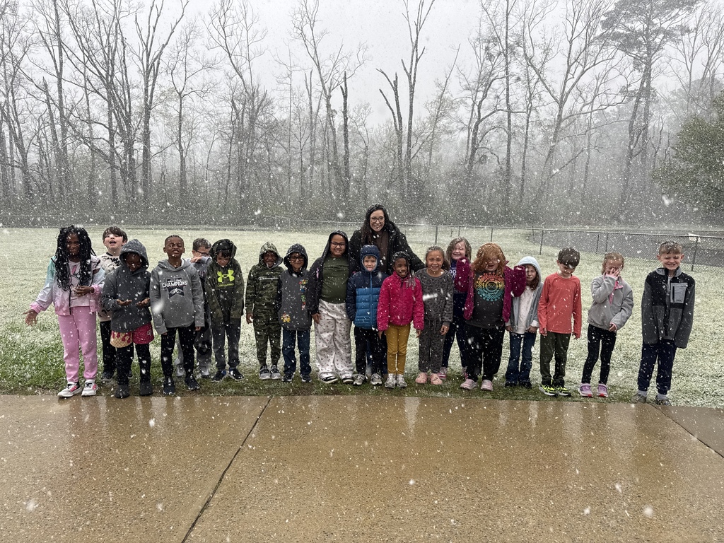 teacher with class in the snow
