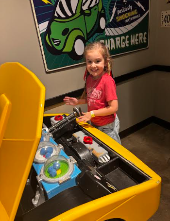 little girl doing a science project
