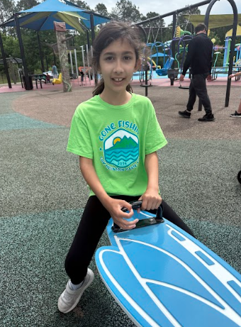 little girl on seesaw