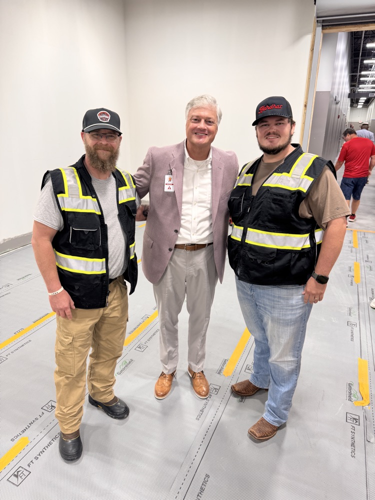 Three men standing