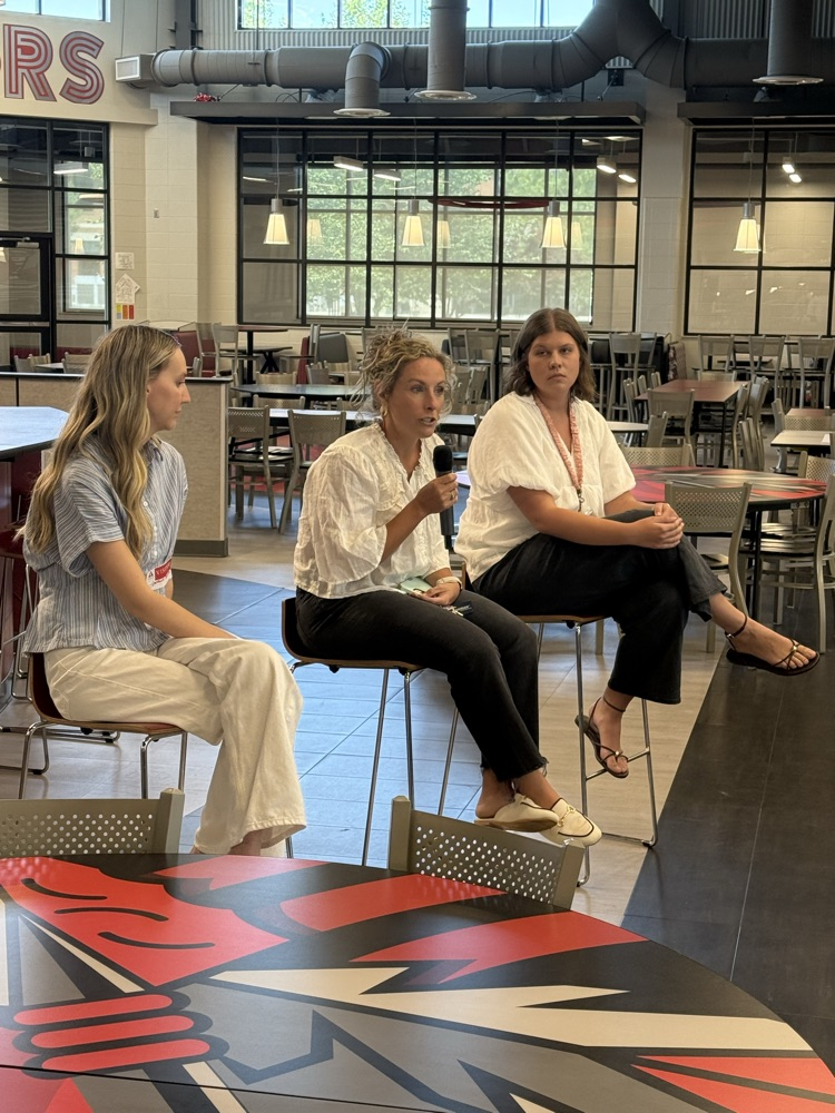 Three teachers on a panel, all female