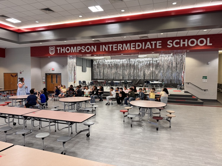 Wide angle of cafeteria with students