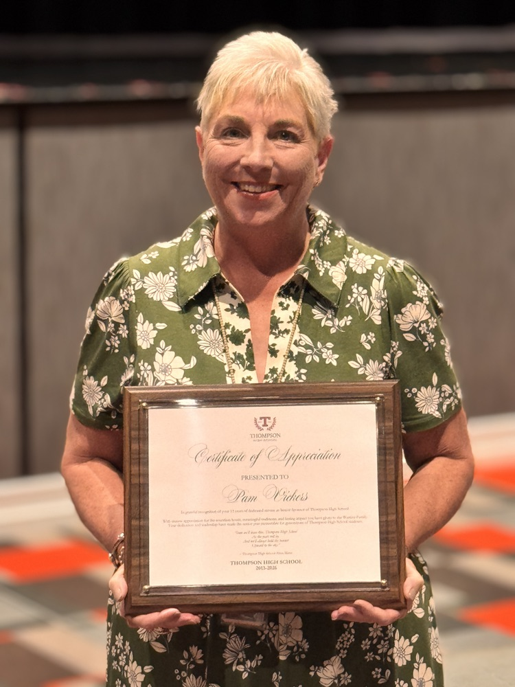 woman holding certificate 
