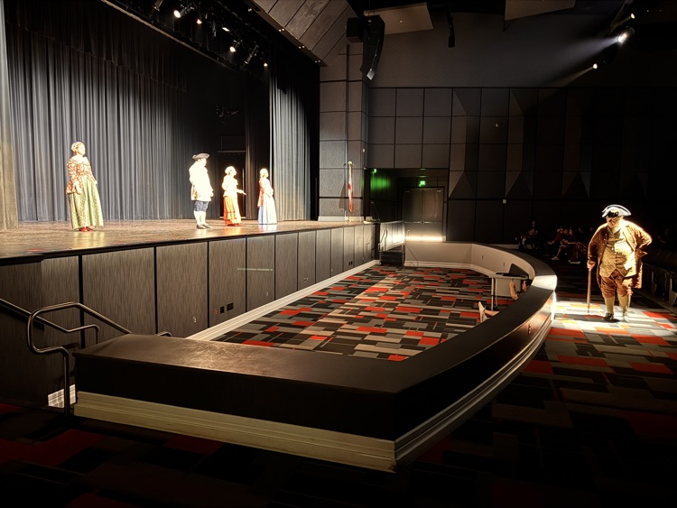 actors on stage and off stage
