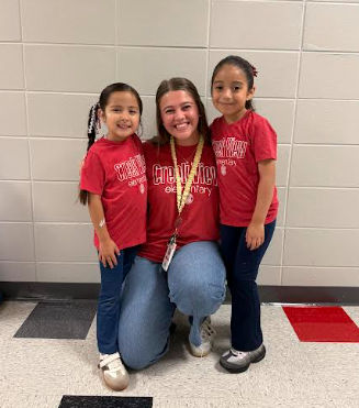 teacher with 2 girls
