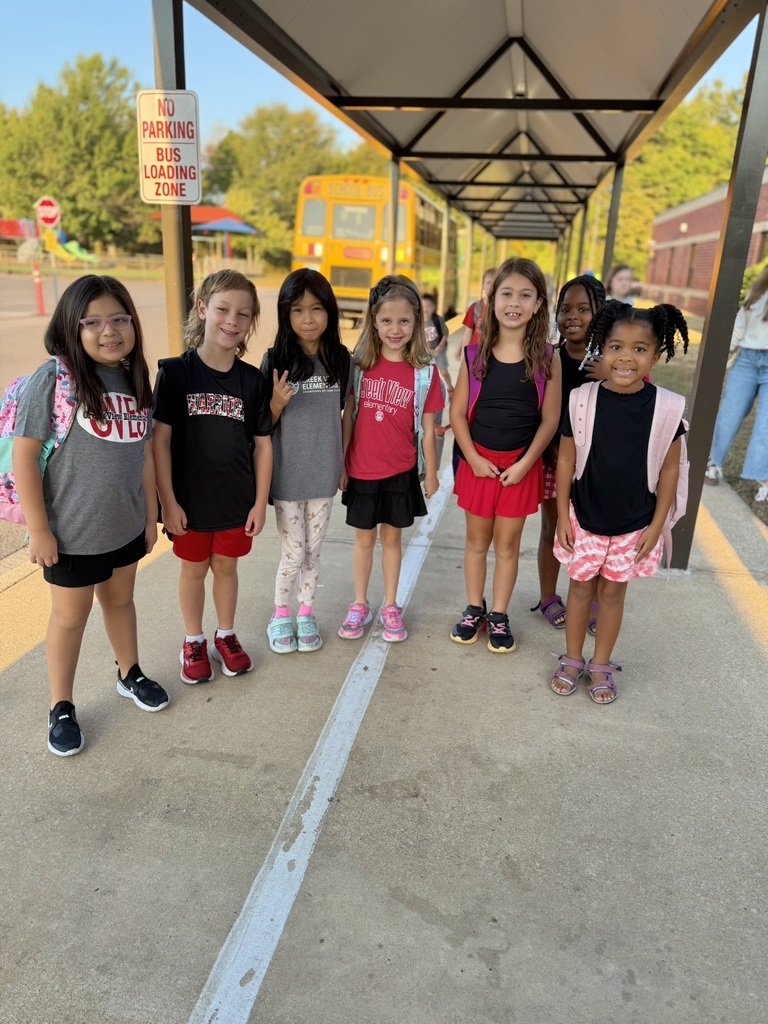 girls standing outside