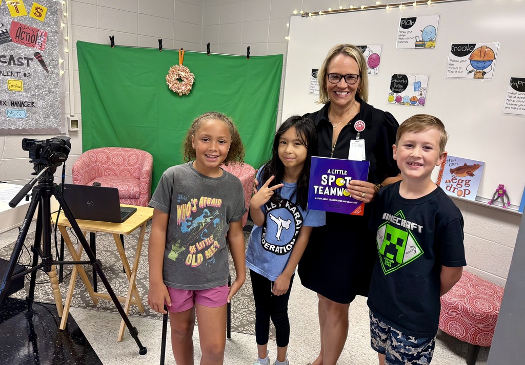 Ms. Cole with 3 students