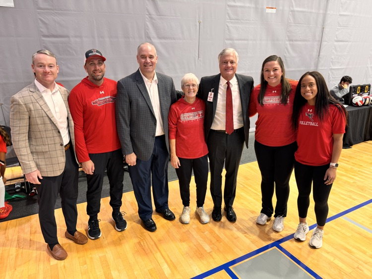 group of people on volleyball court