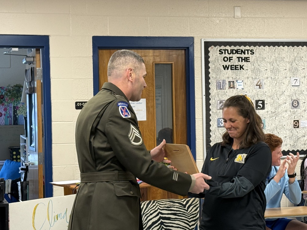 Mrs. Roundtree receiving Award of Excellence