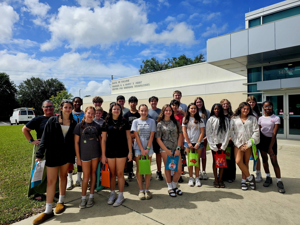 Mrs. Osteen's students in front of a Santa Fe College building.  