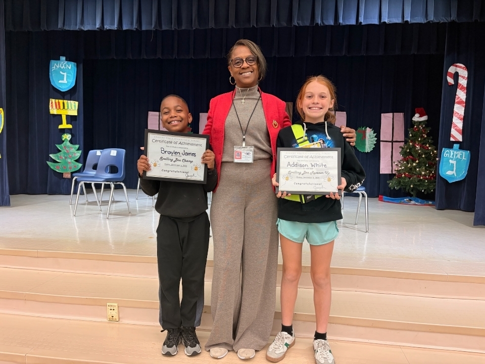 Photo of Mrs. Rolle, Braylen James, and Addison White