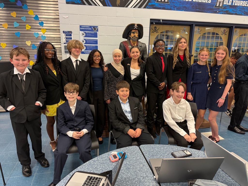 Group photo in front of pirate statue!