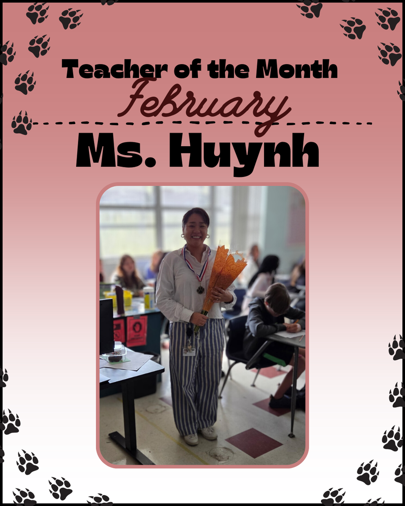 Teacher with bouquet of flowers and a par print medal.  