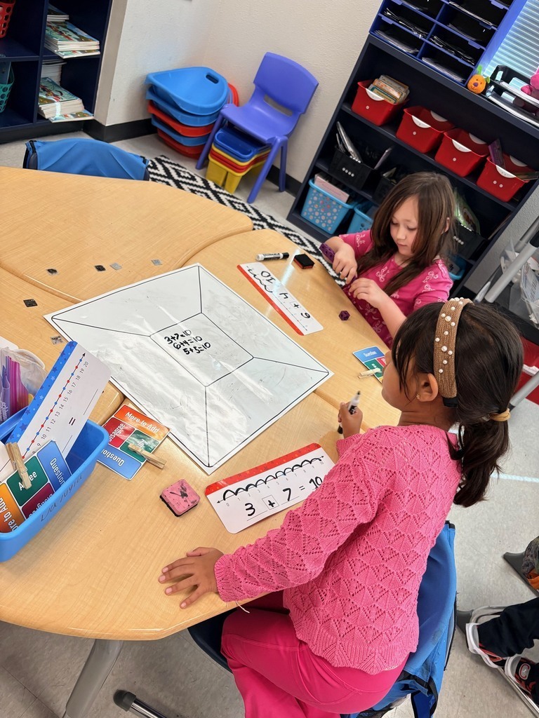 students working at desks on math