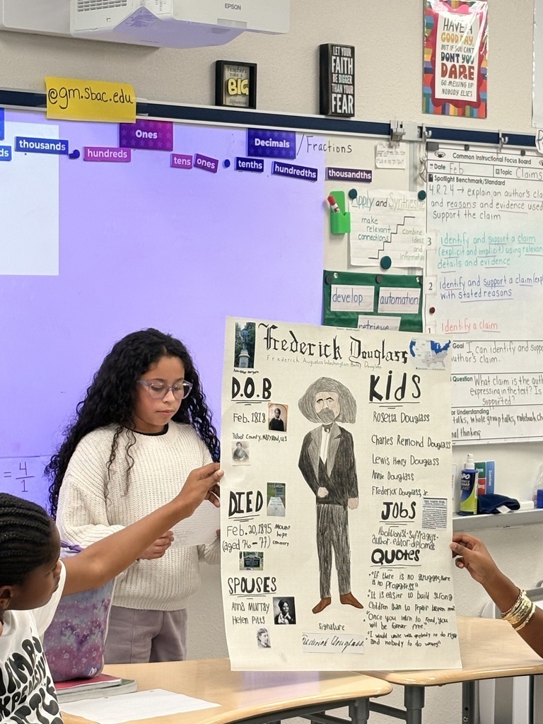student with display on frederick douglas