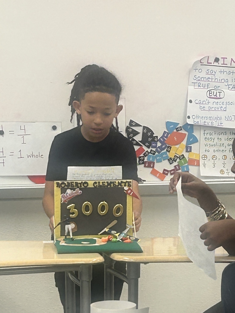 student with display of Roberto Clemente